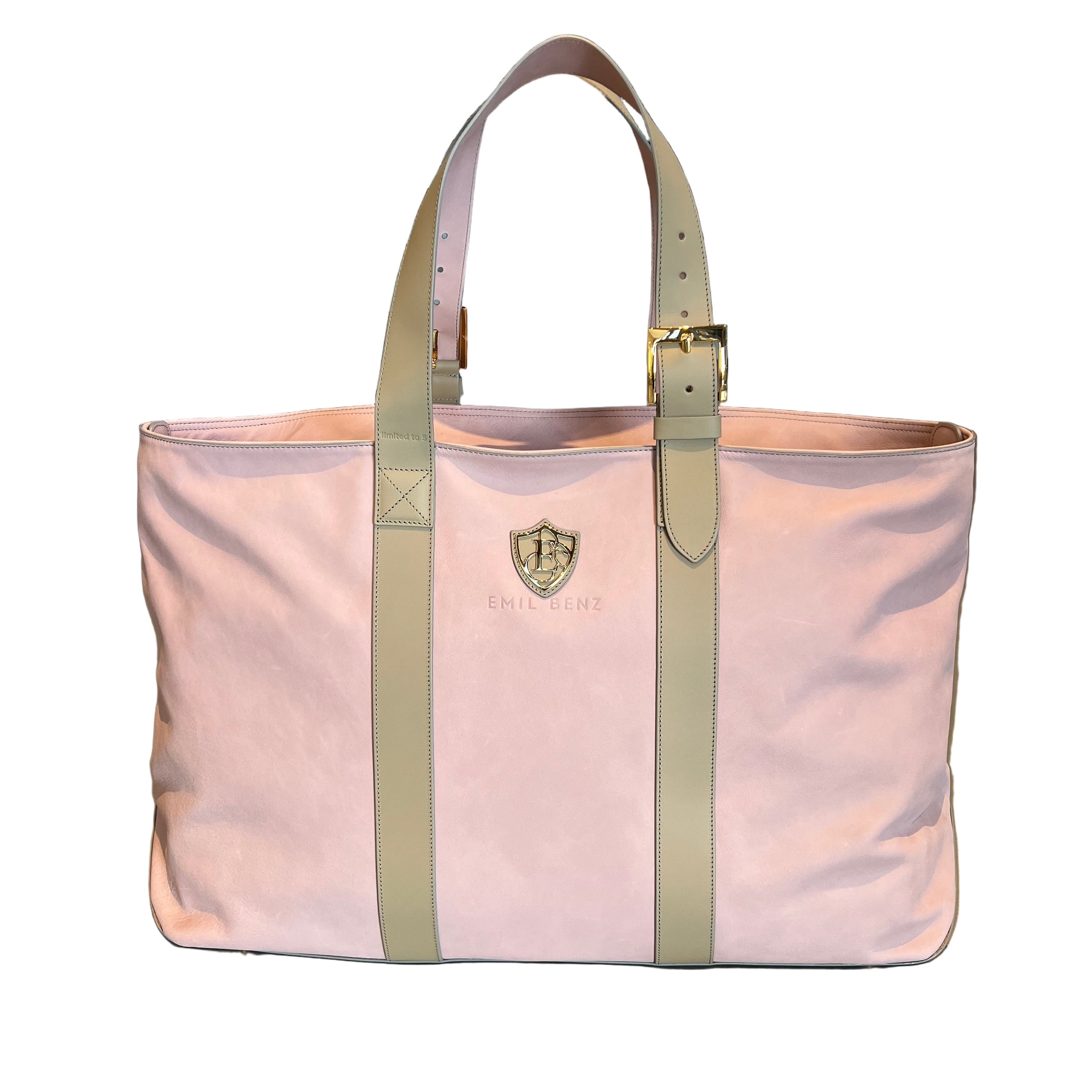 Pink tote bag with a gold buckle