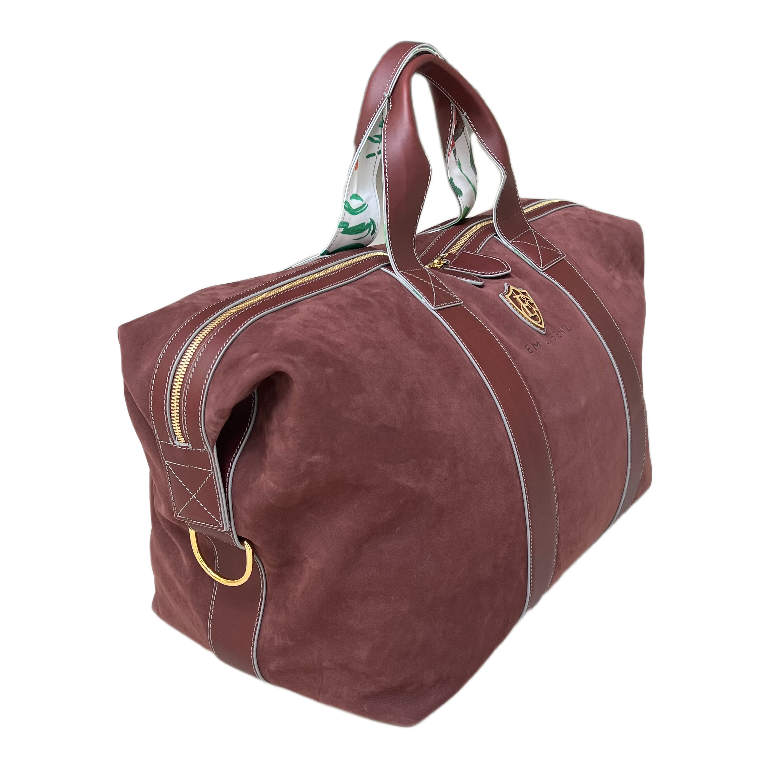 Brown duffel bag with gold accents on a white background